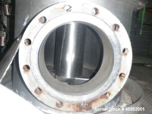 Used Votator Turba-Film Agitated Thin Film Evaporator, Model 18-072. 316L Stainless steel. 26 square feet heat transfer area. (1) 18" diameter x 72" long vertical chamber with a 4 point rotor. Intern...