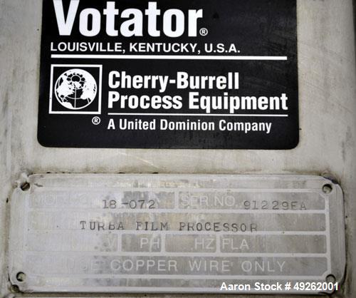 Used Votator Turba-Film Agitated Thin Film Evaporator, Model 18-072. 316L Stainless steel. 26 square feet heat transfer area. (1) 18" diameter x 72" long vertical chamber with a 4 point rotor. Intern...
