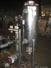 Used Artisan Rotoherm evaporation system, consisting of (1) 5 sq ft surface area Artisan Rototherm counter-curent evaporator, 316L stainless steel construction, approximately 18