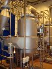 Used APV 2 Stage Evaporator, Capacity Approximately 4400 lbs/hr (2000 Kg/hr) finished product consisting of: (2) APV evaporators 29.25” diameter x 46.8” straight side (750 mm diameter x 1200 mm strai...