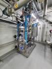 Used Artisan Horizontal Thin Film Evaporator,  316 Stainless steel. Max AWP 60 PSIG 570 deg F shell, Max Aewp 165 PSIG at 570, Min DMT  20 deg F at 60 PSIG, Max AWP 150 PSIG at 570 deg F, Max AEWP 15...