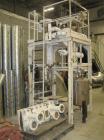 Used Luwa Thin Film Evaporator, 5.4 square feet, model LN-0050, stainless steel. Driven by a  2 hp xp motor. Includes a condenser, approximate 50 gallon stainless steel receiver tank, 20