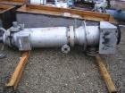 Used LCI Vertical Turbofan Thin Film Evaporator. 11.8 square feet, 316 stainless steel construction. 12