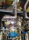 Used Pfaudler Wipe Film Evaporator. Approximately 25 square feet, 316 stainless steel, internal rated 25 psi/full vacuum @ 650 deg F, jacket rated 150 psi @ 650 deg F, 4 gpm, rated capacity 2 mm gall...