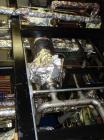 Used Pfaudler Wipe Film Evaporator. Approximately 25 square feet, 316 stainless steel, internal rated 25 psi/full vacuum @ 650 deg F, jacket rated 150 psi @ 650 deg F, 4 gpm, rated capacity 2 mm gall...