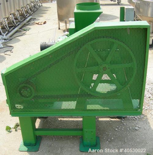 Used InstaPro Extruder, Model 100, serial  #282. 50 hp, 230/460V, 1800 rpm, with screw feeder, variable speed. Barrel 4" diameter x 19" long. Mounted on carbon steel base. Drive for feeder only.