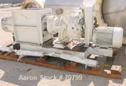Used Bonnot Chopper/Extruder, 316/304 Stainless Steel. Non-jacketed trough 30" long x 20-1/2" wide x 25-1/2" deep. 6" diameter shaft, approximate 20" diameter x 50" long x 6-3/4" pitch screw. Driven ...