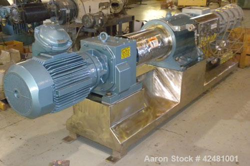 Used Extru-Tech Inline Extruder, Model E750-PDU-PT03-EX-300. Approximately 10’’ diameter 400 series stainless steel tapered screw. 316 Stainless steel jacketed feed section 10’’ x 8-3/4’’, no hopper....
