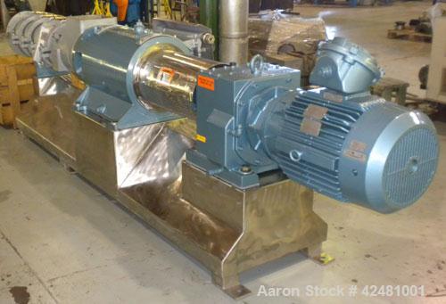 Used Extru-Tech Inline Extruder, Model E750-PDU-PT03-EX-300. Approximately 10’’ diameter 400 series stainless steel tapered screw. 316 Stainless steel jacketed feed section 10’’ x 8-3/4’’, no hopper....