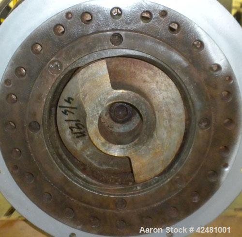 Used Extru-Tech Inline Extruder, Model E750-PDU-PT03-EX-300. Approximately 10’’ diameter 400 series stainless steel tapered screw. 316 Stainless steel jacketed feed section 10’’ x 8-3/4’’, no hopper....