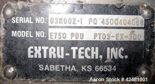 Used Extru-Tech Inline Extruder, Model E750-PDU-PT03-EX-300. Approximately 10’’ diameter 400 series stainless steel tapered screw. 316 Stainless steel jacketed feed section 10’’ x 8-3/4’’, no hopper....