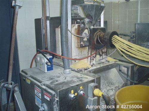 Used Maddox MX650 Baxed Extruder capable of up to 500 lbs per hour (226 kg/hr) of raw corn curls. Has 275 lb stainless steel hopper. Ingredients:  Degerminated corn meal, degerminated corn grits, ric...