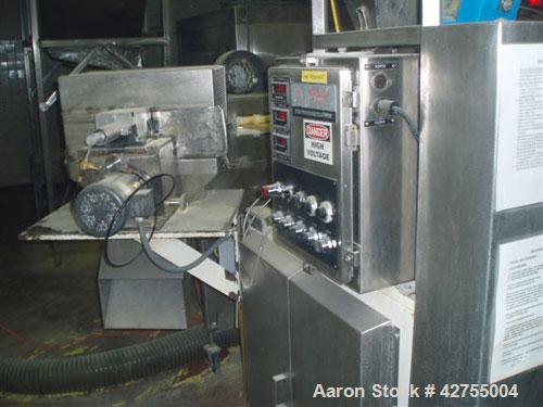 Used Maddox MX650 Baxed Extruder capable of up to 500 lbs per hour (226 kg/hr) of raw corn curls. Has 275 lb stainless steel hopper. Ingredients:  Degerminated corn meal, degerminated corn grits, ric...
