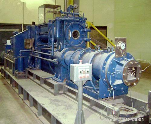 Used Miyazaki Iron Works Co Ltd extruder, model MV-310A. 500 wet kg per hour capacity. Stainless steel screws and barrels, vacuum pump and ancillary. Upper section: 15 kw DC motor. Lower section: 37 ...