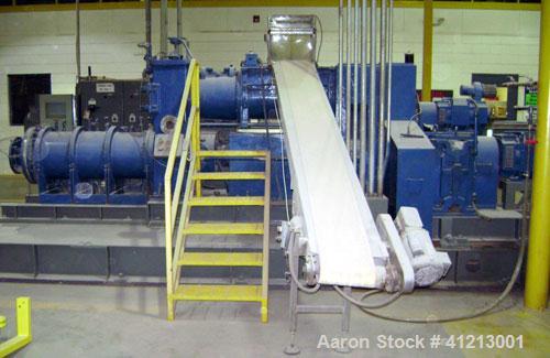 Used Miyazaki Iron Works Co Ltd extruder, model MV-310A. 500 wet kg per hour capacity. Stainless steel screws and barrels, vacuum pump and ancillary. Upper section: 15 kw DC motor. Lower section: 37 ...