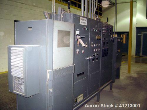 Used Miyazaki Iron Works Co Ltd extruder, model MV-310A. 500 wet kg per hour capacity. Stainless steel screws and barrels, vacuum pump and ancillary. Upper section: 15 kw DC motor. Lower section: 37 ...