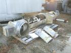 USED: Amandus Kahl continuous reciprocating feeder - paddle mixer,type M500, 316 stainless steel construction. Drive is Eurodrive,1740/118 rpm, 480 volt, 14.2 amps. Overall length is 157