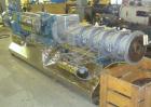 Used Extru-Tech Inline Extruder, Model E750-PDU-PT03-EX-300. Approximately 10’’ diameter 400 series stainless steel tapered screw. 316 Stainless steel jacketed feed section 10’’ x 8-3/4’’, no hopper....