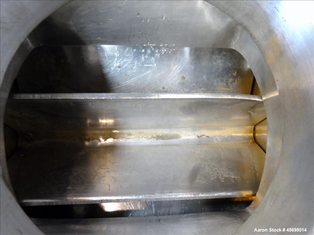 Used Rotary Valve, Stainless Steel. Approximate 8" diameter x 12" wide 8 blade open vane rotor. Top feed, bottom discharge. Driven by a 1/2hp, 3/60/230/460 volt, 1700 rpm gear motor, ratio 47.75 to 1...