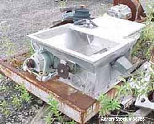 Used Screw Feeder, 304 Stainless Steel, 18" x 24" x 18" deep. Has delumper bar. Has additional product bin 20" x 20" x 18" deep with capacitance probe. Unit is chain and sprocket driven by 1/2 hp, 3/...