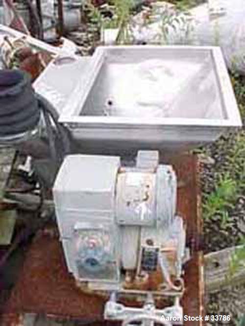 Used Screw Feeder, 304 Stainless Steel, 18" x 24" x 18" deep. Has delumper bar. Has additional product bin 20" x 20" x 18" deep with capacitance probe. Unit is chain and sprocket driven by 1/2 hp, 3/...