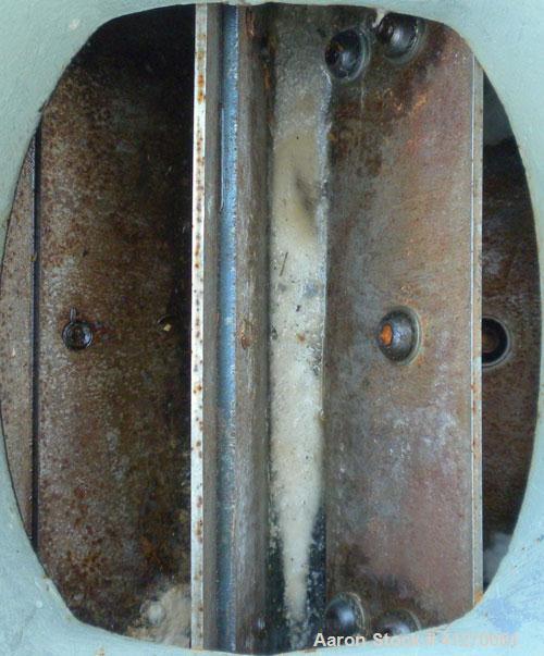 Used Sunco Powder Systems Rotary Airlock, carbon steel. Approximately 8" diameter x 8" wide open vane rotor. 8" inlet/outlet. Driven by a 3/4 hp, 3/60/208-230/460 volt, 1725 rpm gearmotor, ratio 23.5...