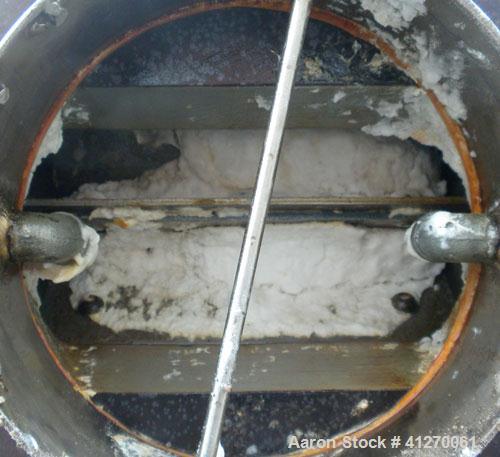 Used Sunco Powder Systems Rotary Airlock, carbon steel. Approximately 8" diameter x 8" wide open vane rotor. 8" inlet/outlet. Driven by a 3/4 hp, 3/60/208-230/460 volt, 1725 rpm gearmotor, ratio 23.5...