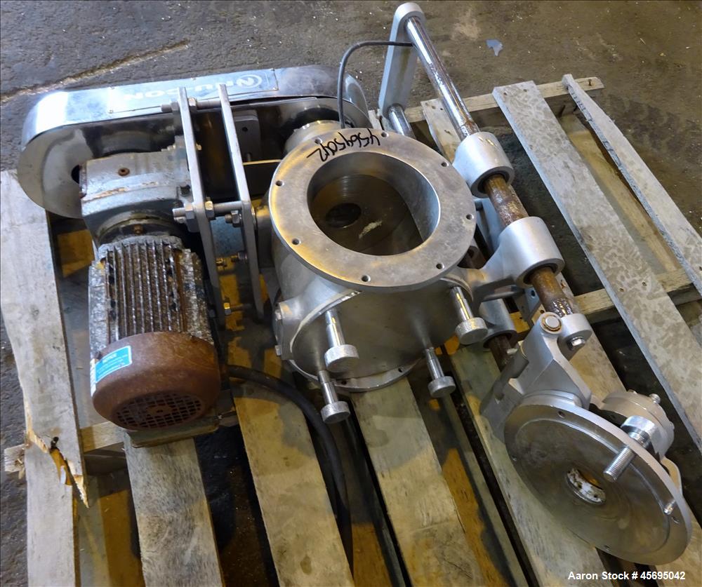 Used Nu-Con Equipment Rotary Valve, Model DT375DEMU, Stainless Steel. Approximate 0.176 Cubic feet per revolution. 7-1/2" Diameter x 7-1/2" wide 8 blade open vane rotor. Top feed, bottom discharge. D...