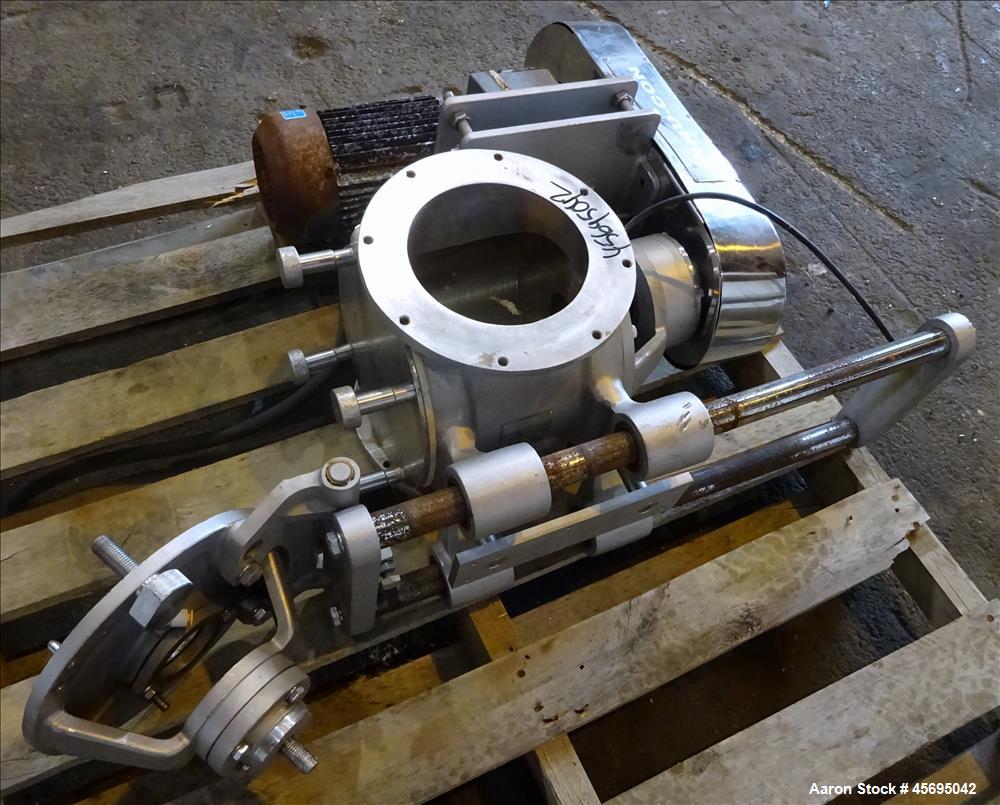 Used Nu-Con Equipment Rotary Valve, Model DT375DEMU, Stainless Steel. Approximate 0.176 Cubic feet per revolution. 7-1/2" Diameter x 7-1/2" wide 8 blade open vane rotor. Top feed, bottom discharge. D...