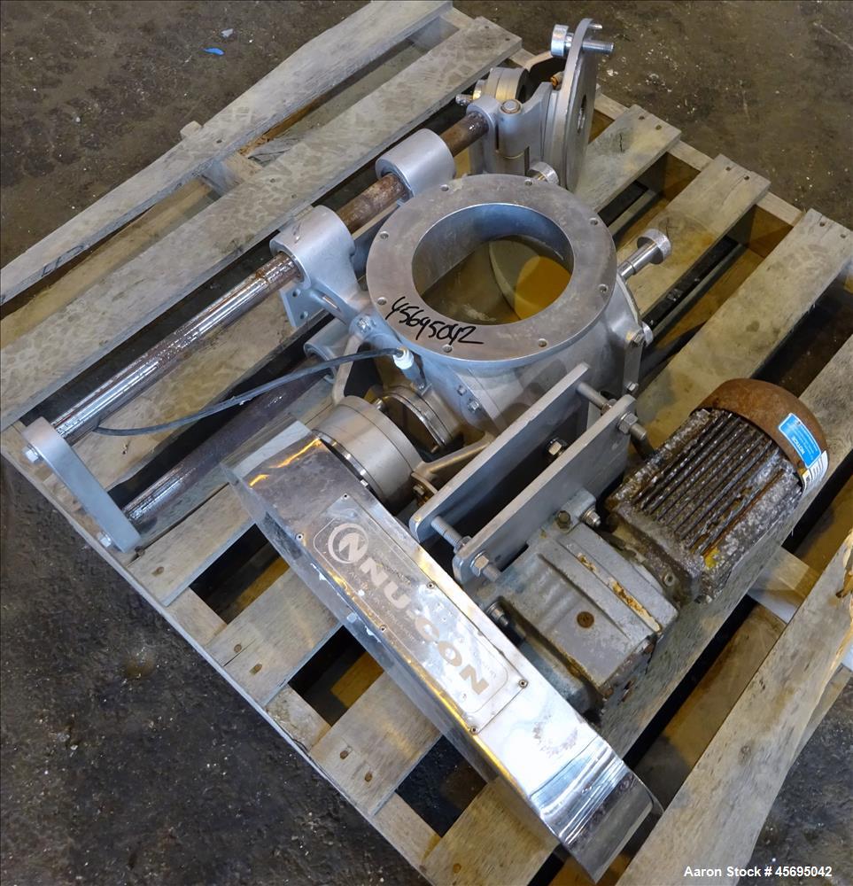 Used Nu-Con Equipment Rotary Valve, Model DT375DEMU, Stainless Steel. Approximate 0.176 Cubic feet per revolution. 7-1/2" Diameter x 7-1/2" wide 8 blade open vane rotor. Top feed, bottom discharge. D...