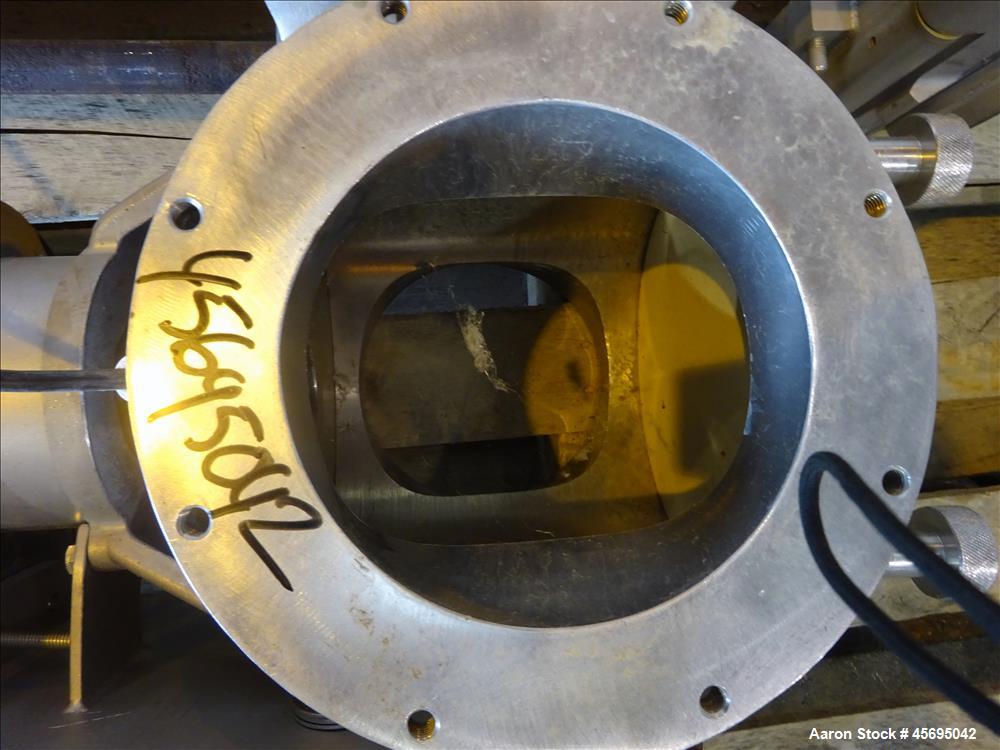 Used Nu-Con Equipment Rotary Valve, Model DT375DEMU, Stainless Steel. Approximate 0.176 Cubic feet per revolution. 7-1/2" Diameter x 7-1/2" wide 8 blade open vane rotor. Top feed, bottom discharge. D...