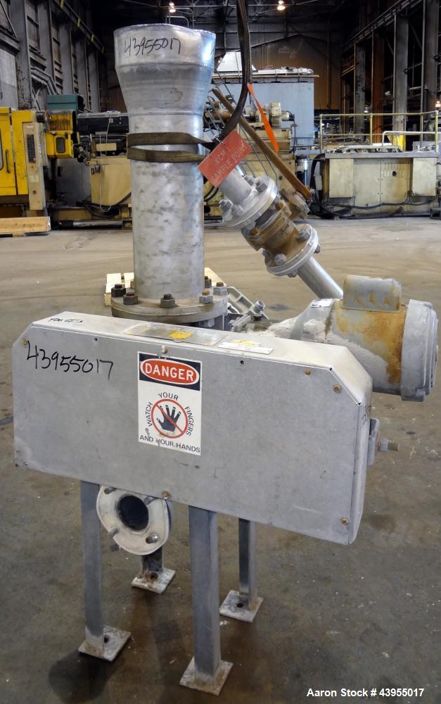 Used Semco Rotary Valve, Model XHD-6, Aluminum Housing. Approximate 0.10 cubic feet per revolution. Driven by a 1/2 hp, 1/60/115/208-230 volt, 1725 rpm gear motor, ratio 39 to 1. Includes a hopper. M...