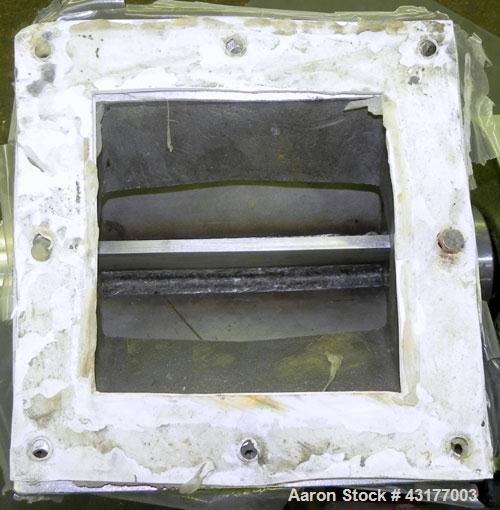 Used Smoot Type 5 Rotary Valve, Model FT9, 316 Stainless Steel. Approximately 0.27 cubic feet per revolution.  8" Diameter x 8" wide open vane 304 stainless steel rotor.  8" x 8’’ Inlet/outlet. Drive...