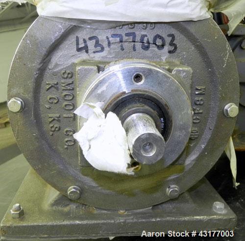 Used Smoot Type 5 Rotary Valve, Model FT9, 316 Stainless Steel. Approximately 0.27 cubic feet per revolution.  8" Diameter x 8" wide open vane 304 stainless steel rotor.  8" x 8’’ Inlet/outlet. Drive...