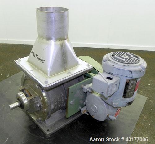 Used Smoot Type 5 Rotary Valve, Model FT9, 316 Stainless Steel. Approximately 0.27 cubic feet per revolution.  8" Diameter x 8" wide open vane 304 stainless steel rotor.  8" x  8’’ Inlet/outlet. Driv...