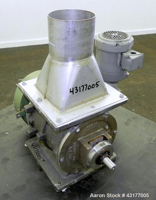 Used Smoot Type 5 Rotary Valve, Model FT9, 316 Stainless Steel. Approximately 0.27 cubic feet per revolution.  8" Diameter x 8" wide open vane 304 stainless steel rotor.  8" x  8’’ Inlet/outlet. Driv...