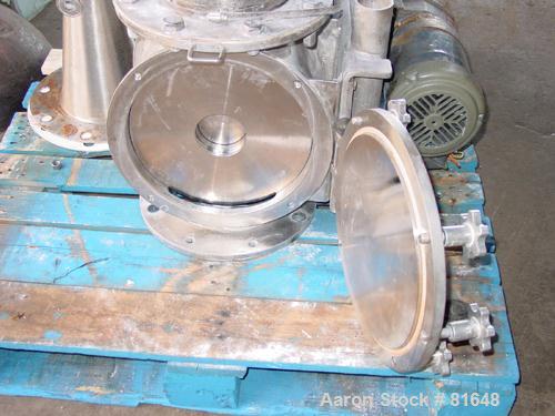 USED: Young 12" rotary airlock, stainless steel. Approx 3/4 hp motor.