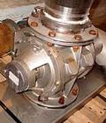 Used AZO Rotary Airlock, Model AL200, stainless steel. Includes a receiving hopper and stainless steel cyclone. Driven by an approximate 3 hp motor.