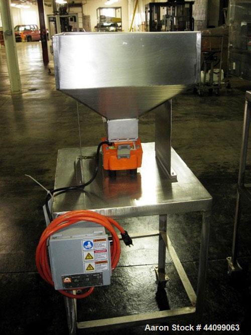 Used Eriez Vibrating Feeder, Model N12-FT-115, Style 26. 4" Wide chute, 15"W x 20"L  hopper, on stainless steel stand serial # 5586-20