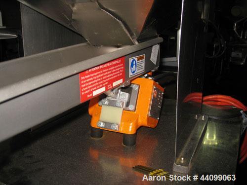 Used Eriez Vibrating Feeder, Model N12-FT-115, Style 26. 4" Wide chute, 15"W x 20"L  hopper, on stainless steel stand serial # 5586-20