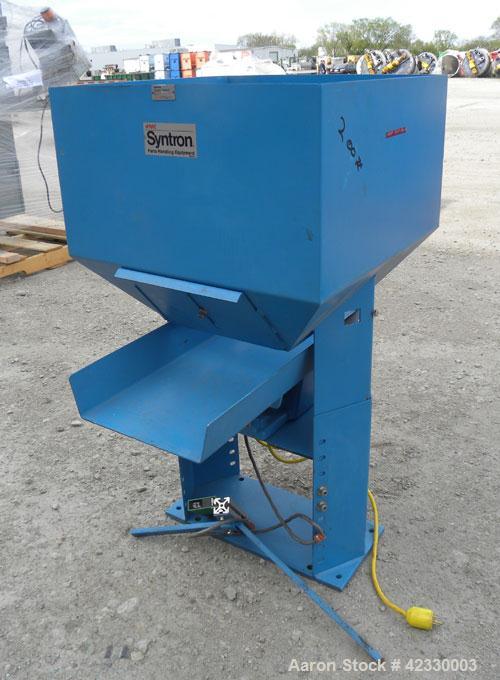 Used FMC Magnetic Vibratory Feeder, model F-010B, carbon steel. Approximately 10’’ wide x 20’’ long pan, 60 hz/115 volt. Includes an FMC controller and a B21911 supply hopper. Mounted on an adjustabl...
