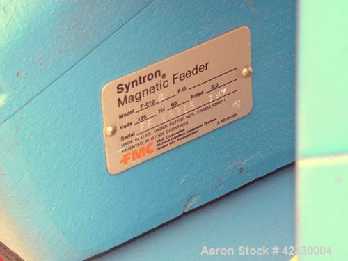 Used FMC Magnetic Vibratory Feeder, model F-010B, carbon steel. Approximately 10’’ wide x 20’’ long pan, 60 hz/115 volt. Includes an FMC controller and a B21911 supply hopper. Mounted on an adjustabl...