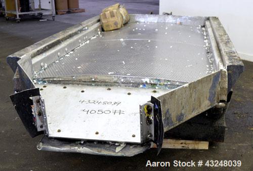 Used Kinergy Vibratory Feeder, 304 Stainless Steel. Single deck, 2 separation Approximate 48" wide x 96" long deck with approximate 3/8" diameter screen holes. End discharge with chute. Driven by a 1...