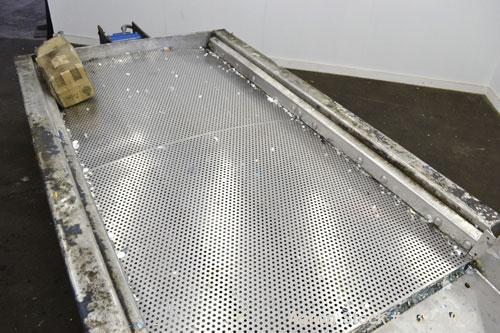 Used Kinergy Vibratory Feeder, 304 Stainless Steel. Single deck, 2 separation Approximate 48" wide x 96" long deck with approximate 3/8" diameter screen holes. End discharge with chute. Driven by a 1...