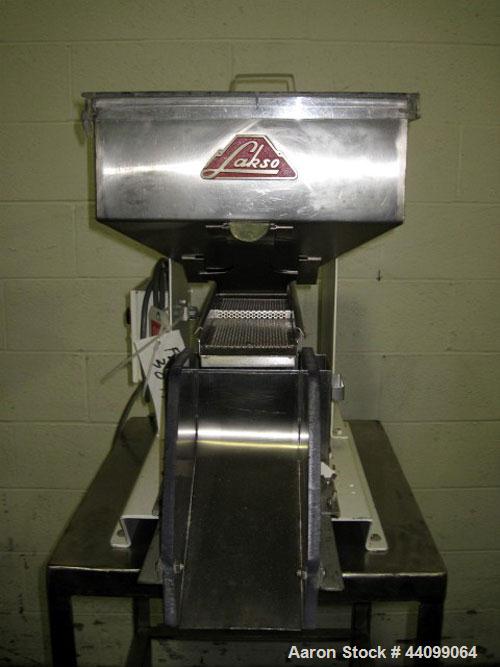 Used Lakso Vibratory Feeder, Model 64. With Eriez model D vibrator, 4"W chute, 15" x 20" hopper, on stainless steel stand, serial # 172.