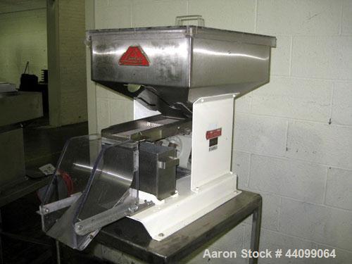 Used Lakso Vibratory Feeder, Model 64. With Eriez model D vibrator, 4"W chute, 15" x 20" hopper, on stainless steel stand, serial # 172.