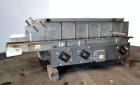Used Eriez Low-Profile Mechanical Vibratory Feeder, Model HVF 5610, Style 9919823, 316 Stainless Steel. 56 Wide x 120 long x approximate 8 deep pan. Includes 26 tall 304 stainless steel side extensio...