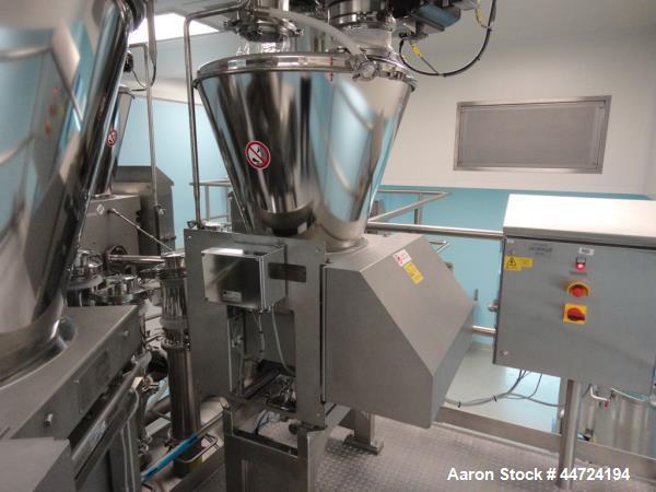 Used Schenk Process Systems Model Mechatron CF GRMD Metered Screw Feeder. Unit includes stainless steel hopper and controls.