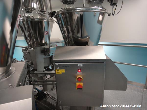 Unused Schenk Process Systems Model Mechatron CF GRMD Metered Screw Feeder. Unit includes stainless steel hopper and controls.