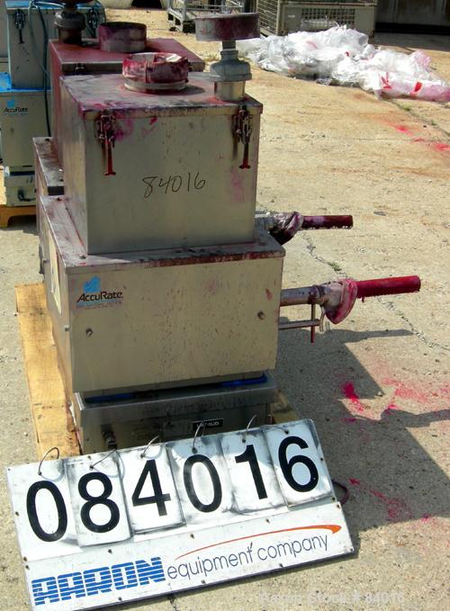 USED: Accurate loss in weight feeding system consisting of (1) 110 pound platform scale; (1) volumetric dry material feeder, model 600; 1.75" diameter x 44" long stainless steel screw, feed rate appr...